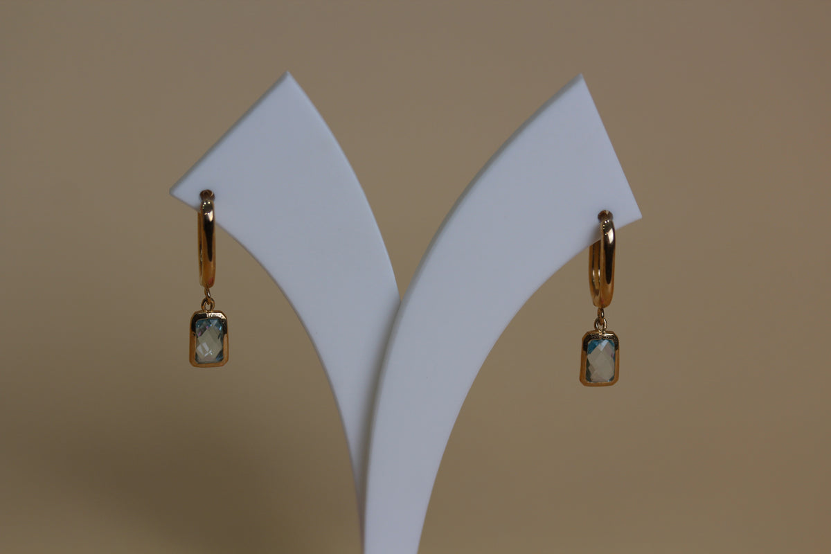 Sky Blue Topaz Huggie
Drop Earrings in 9ct Yellow Gold