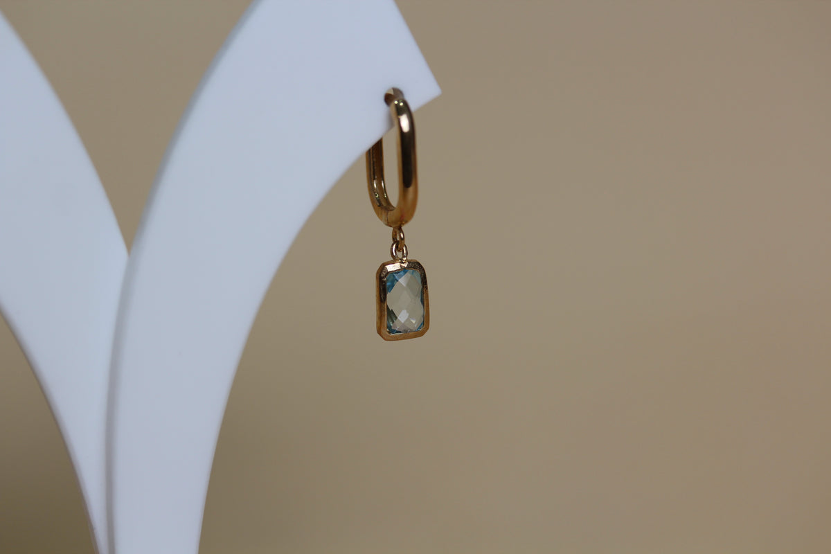 Sky Blue Topaz Huggie
Drop Earrings in 9ct Yellow Gold