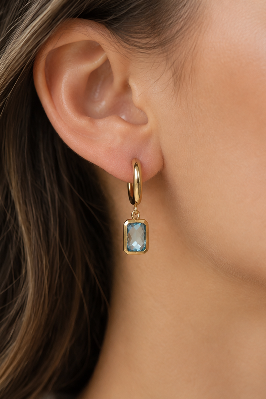 Sky Blue Topaz Huggie
Drop Earrings in 9ct Yellow Gold