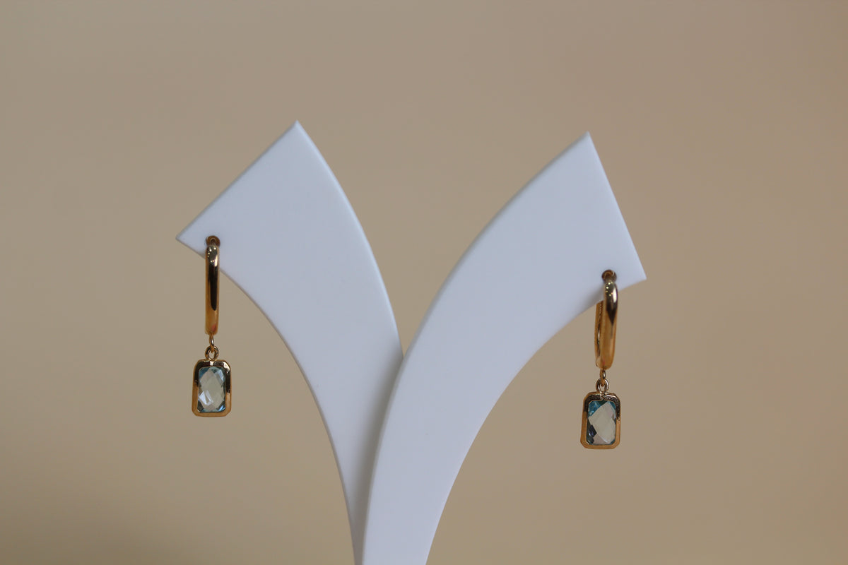 Sky Blue Topaz Huggie
Drop Earrings in 9ct Yellow Gold
