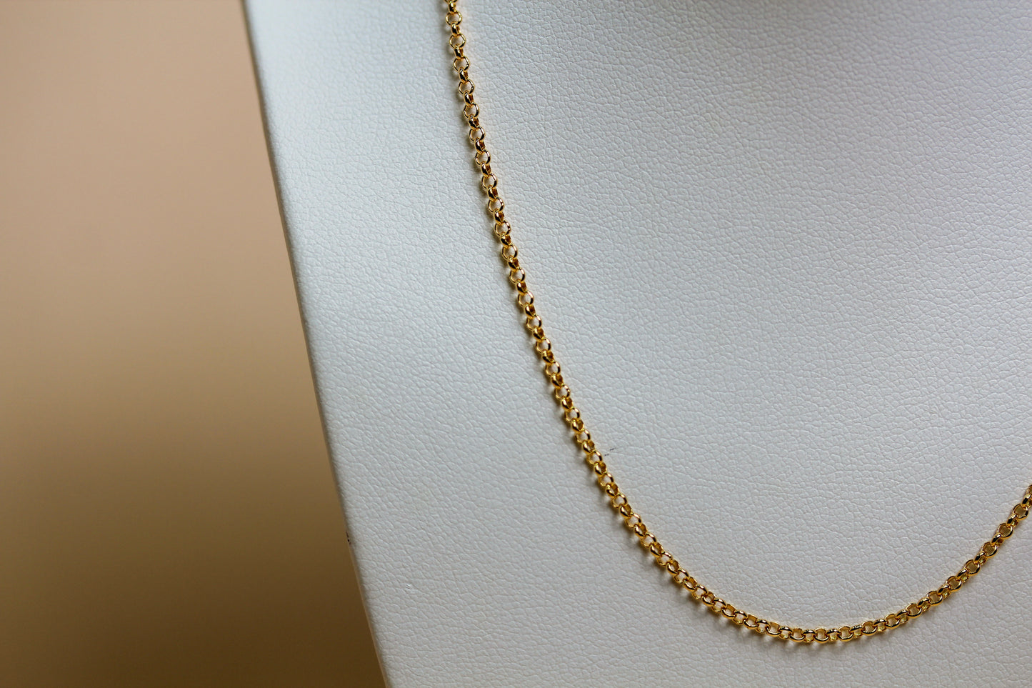 Close-up of fine petite belcher links in solid 9ct yellow gold showing high-polish finish — Jon Crosbie Jeweller